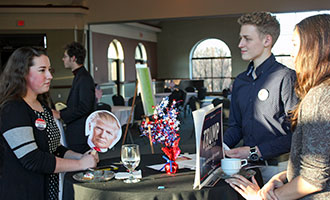 Ana Borish ’19 portrays GOP presidential candidate Donald Trump at OWU's first 'Speed Dating the Republican Candidates' event, a pre-cursor to Mock Convention.